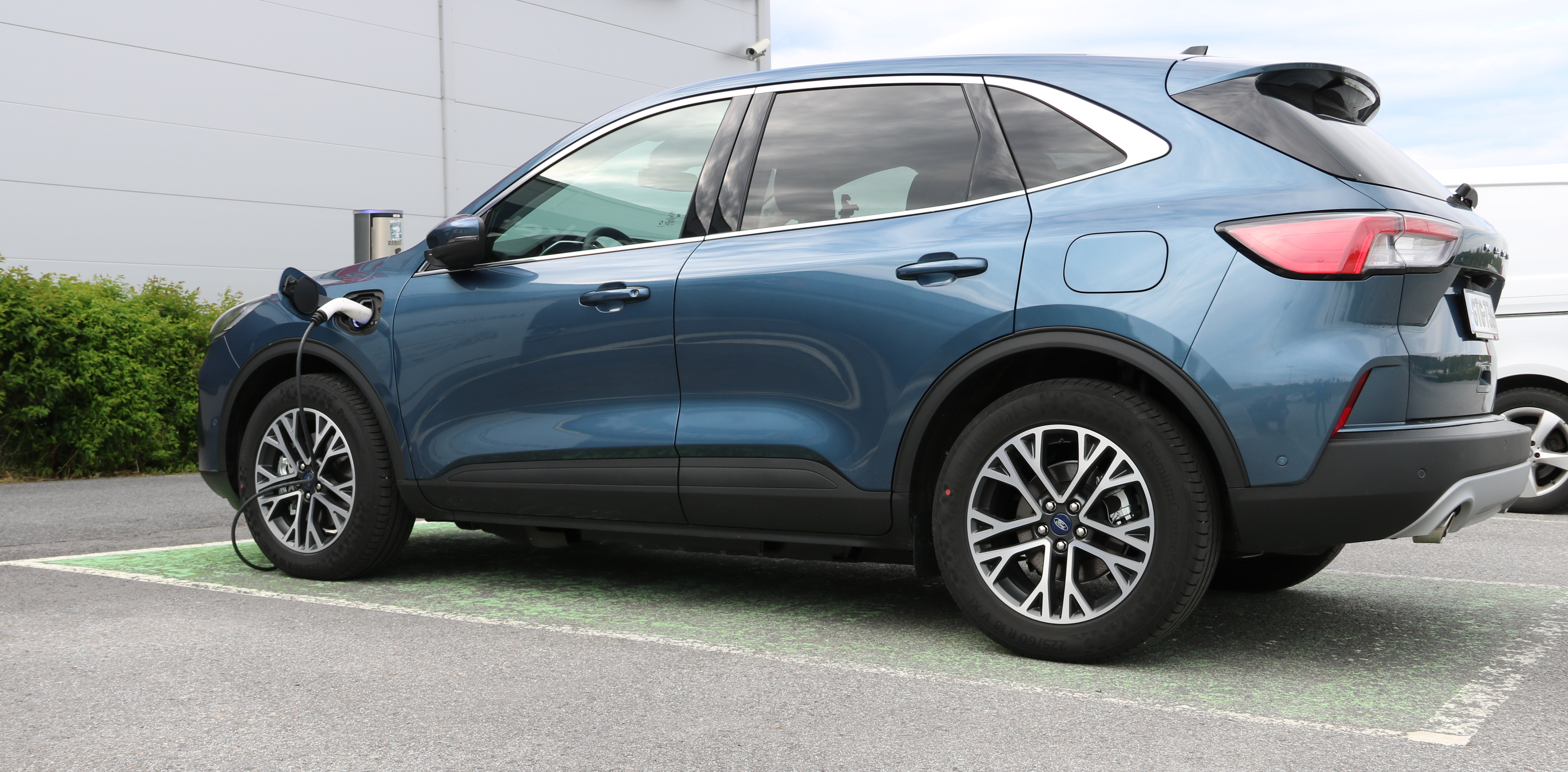 Kuga PHEV charging at a shopping mall